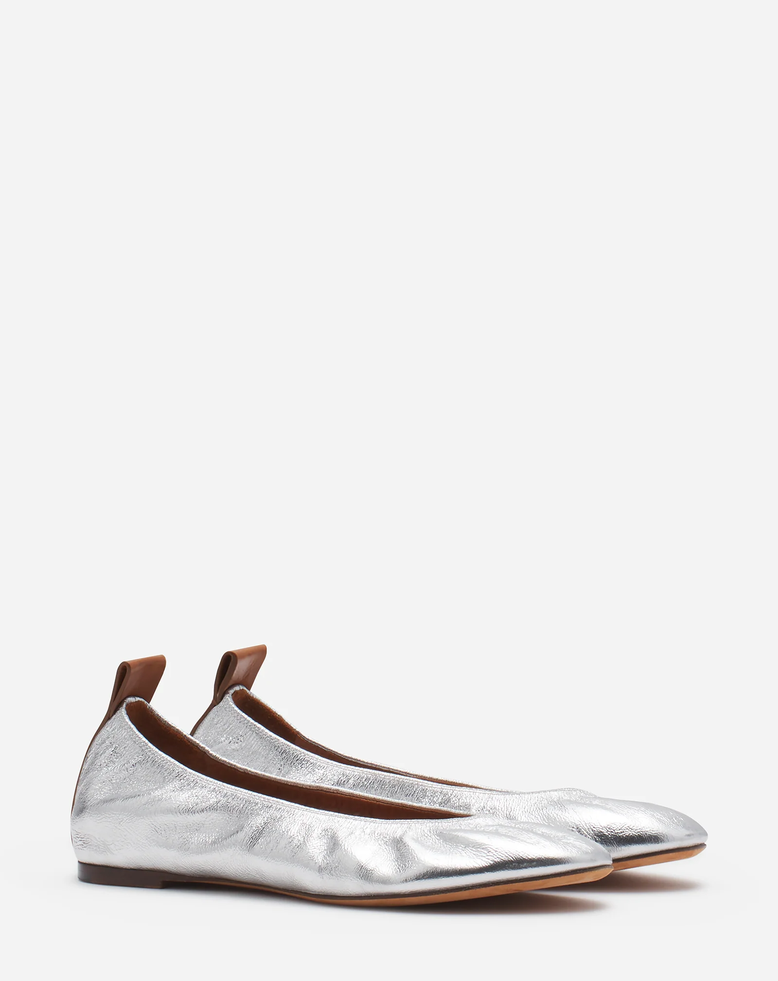 The ballerina flat in metallic leather