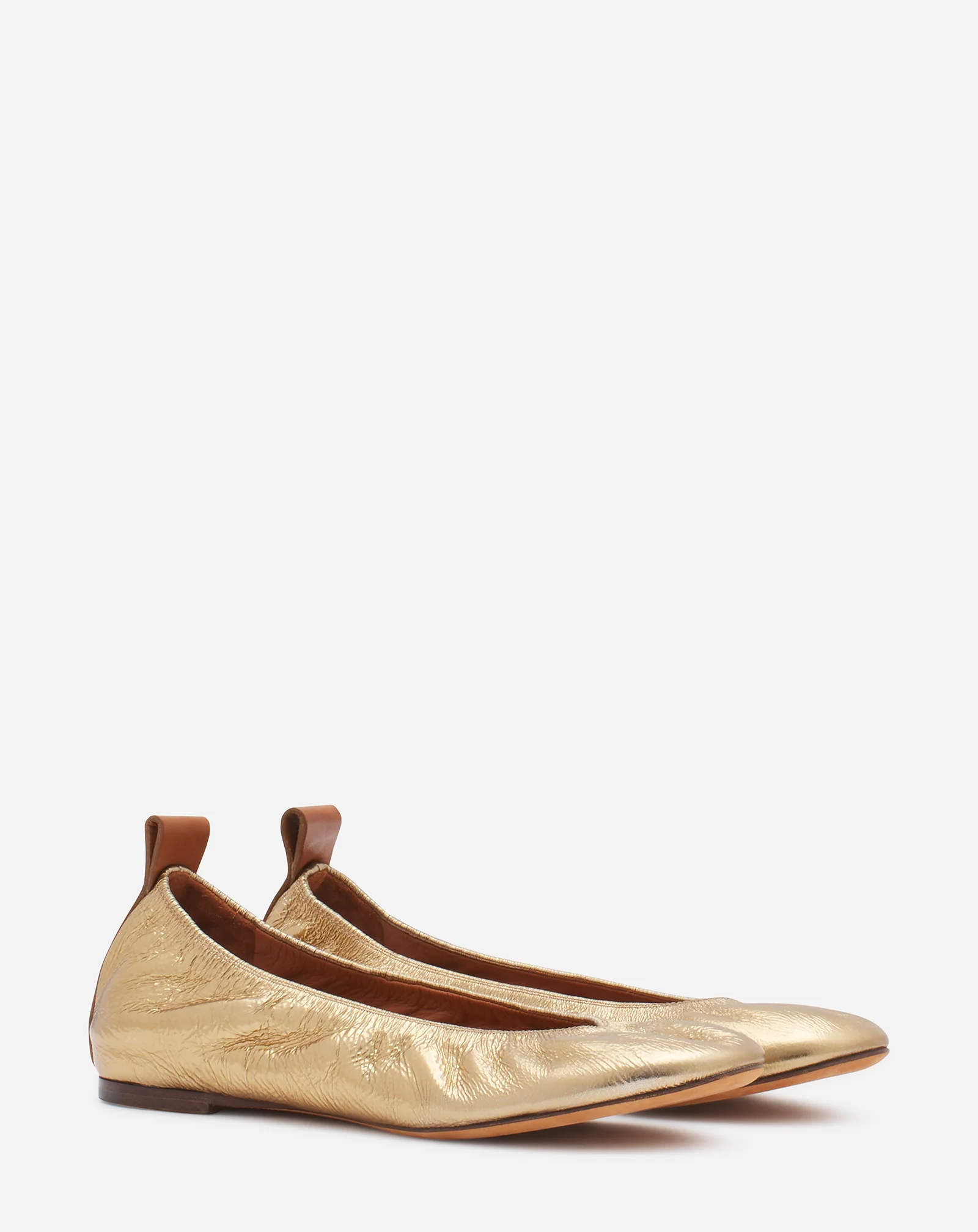 The ballerina flat in metallic leather