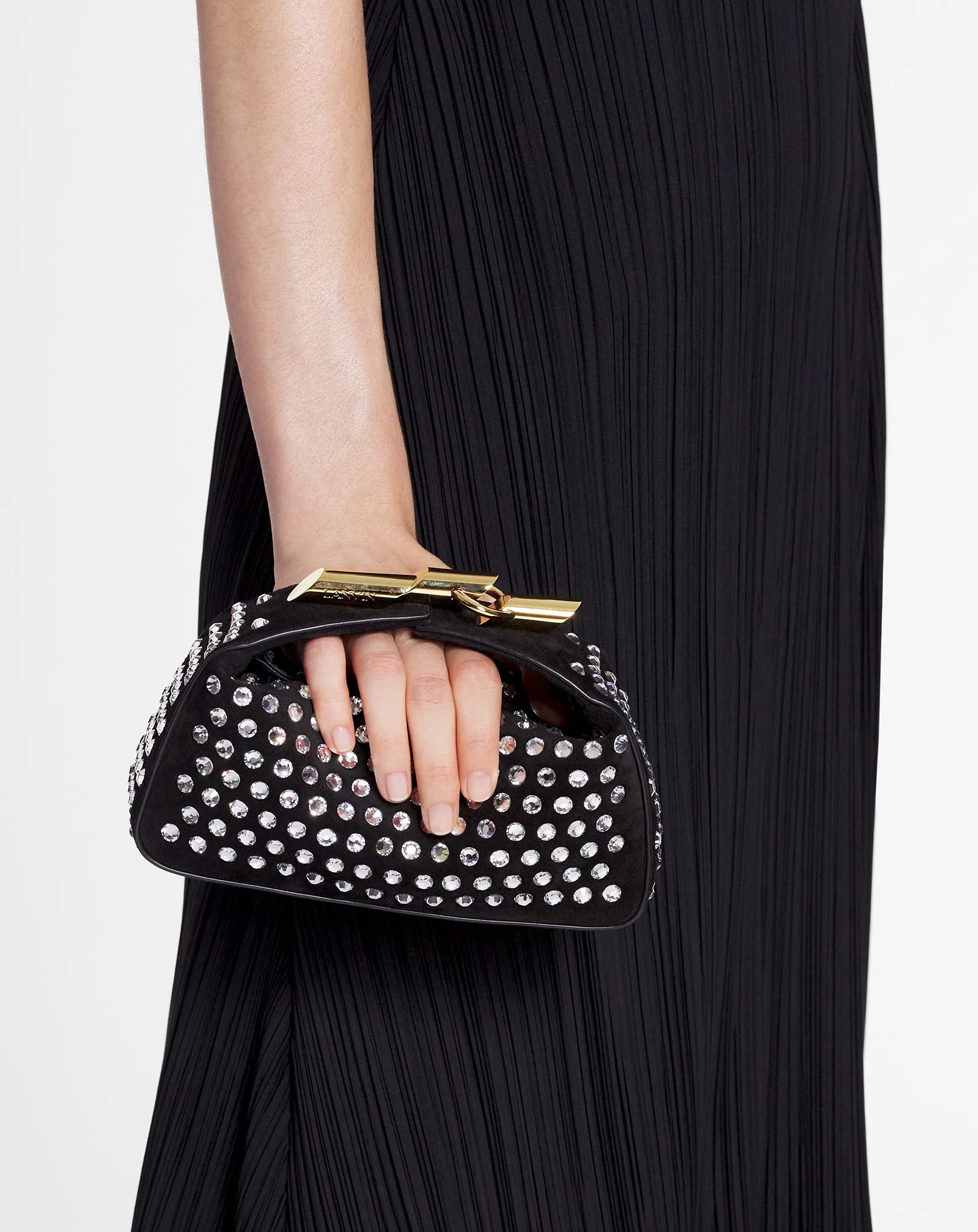 Haute séquence leather clutch bag with rhinestones