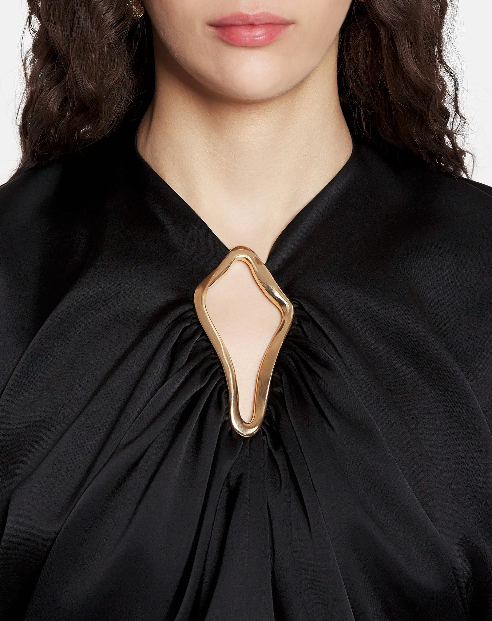 Draped top with eyelet detail