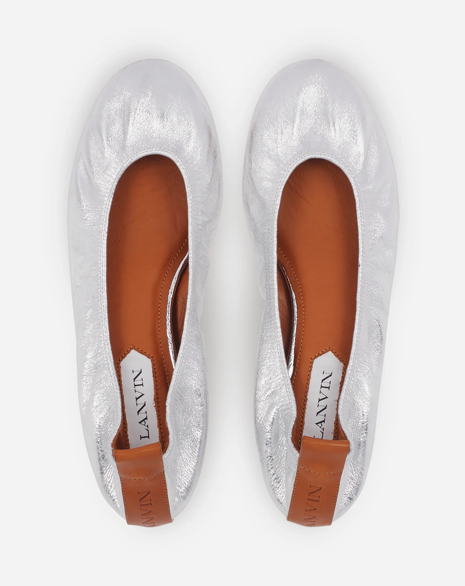 The ballerina flat in metallic leather