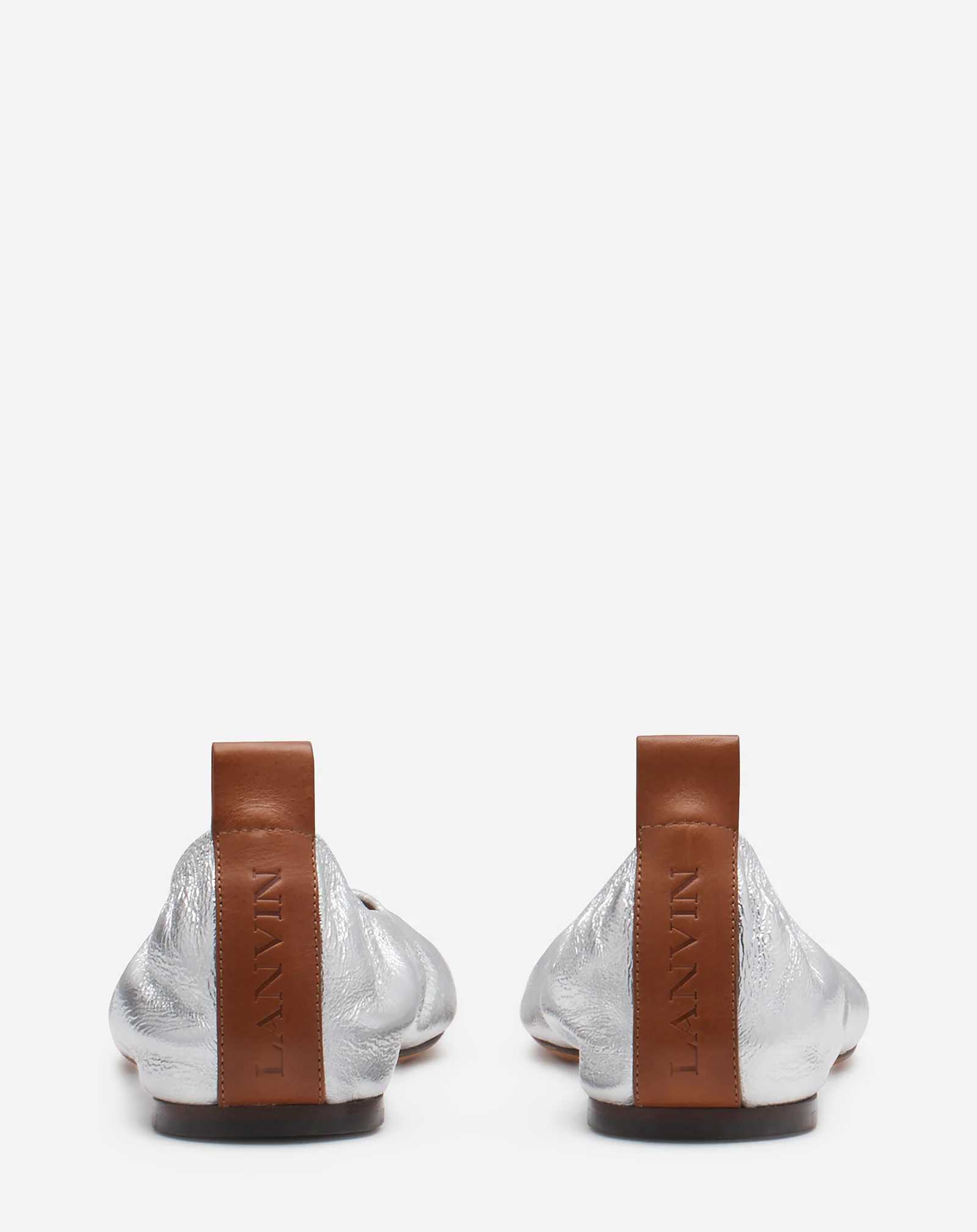 The ballerina flat in metallic leather