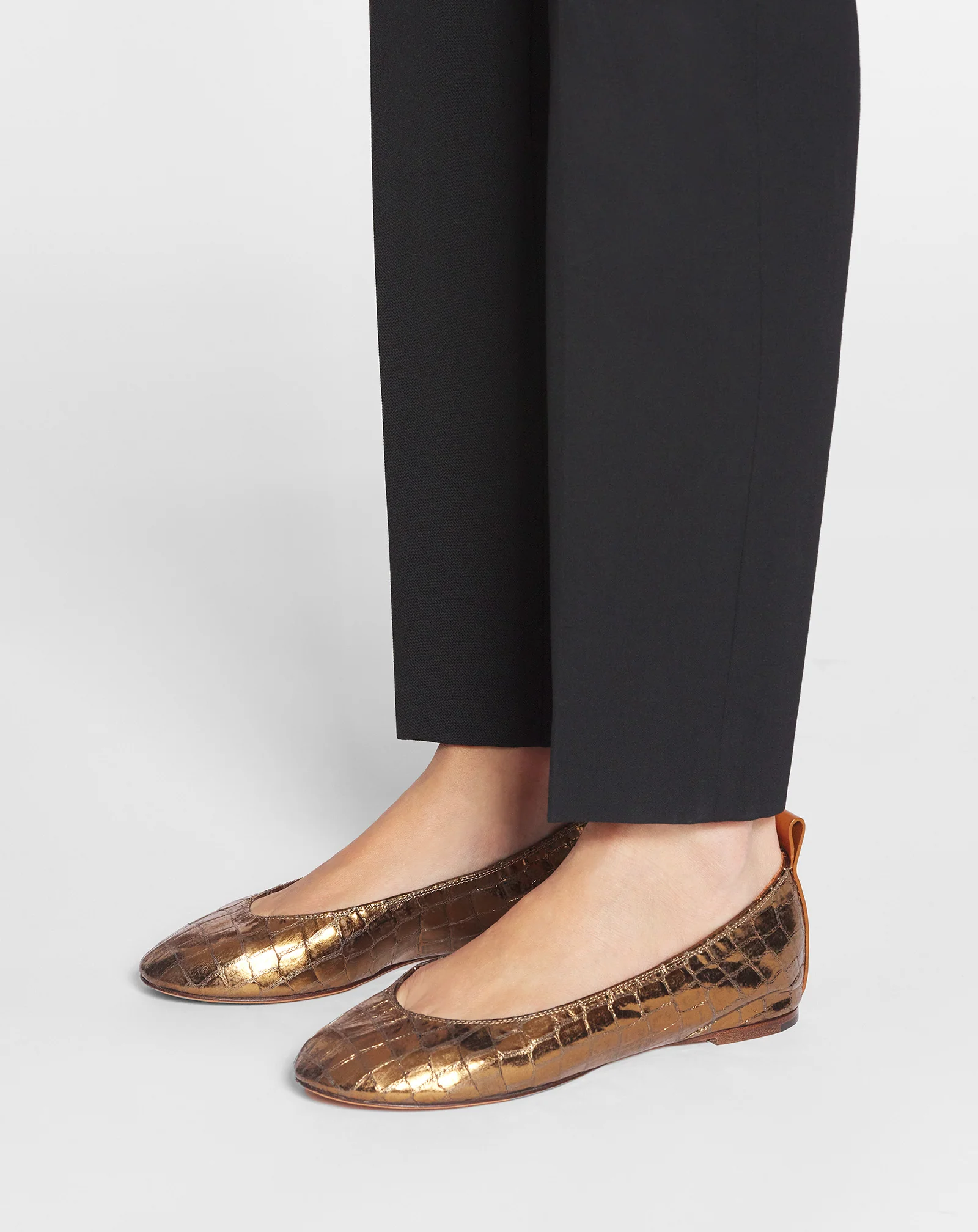 The ballerina in crocodile-effect leather