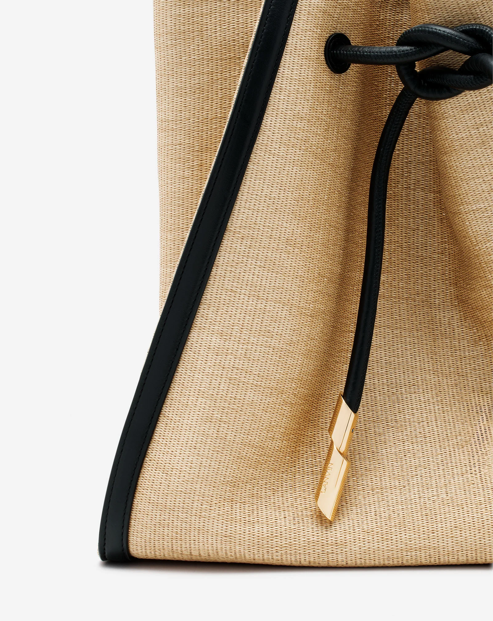 Sequence bag in leather and raffia