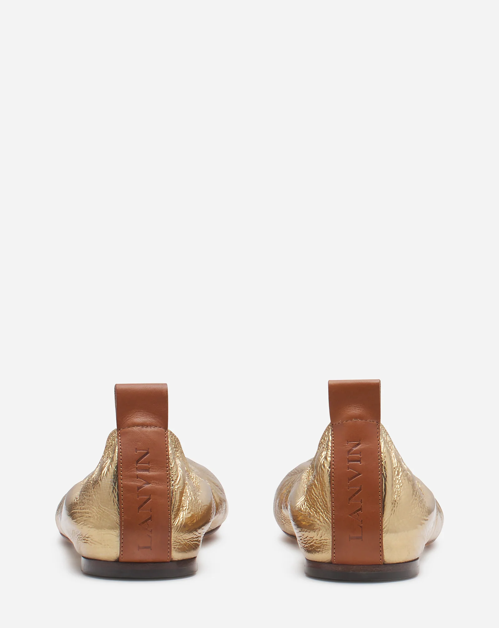 The ballerina flat in metallic leather