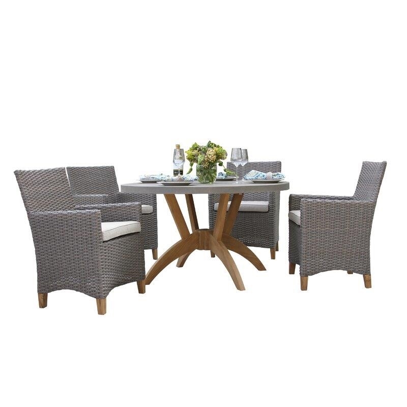 Carter Round 4 - Person 52'' Long Dining Set with Cushions