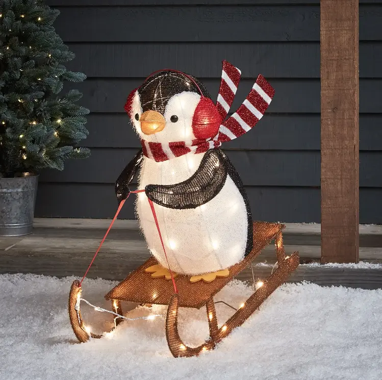 Sledging Penguin Christmas Figure
