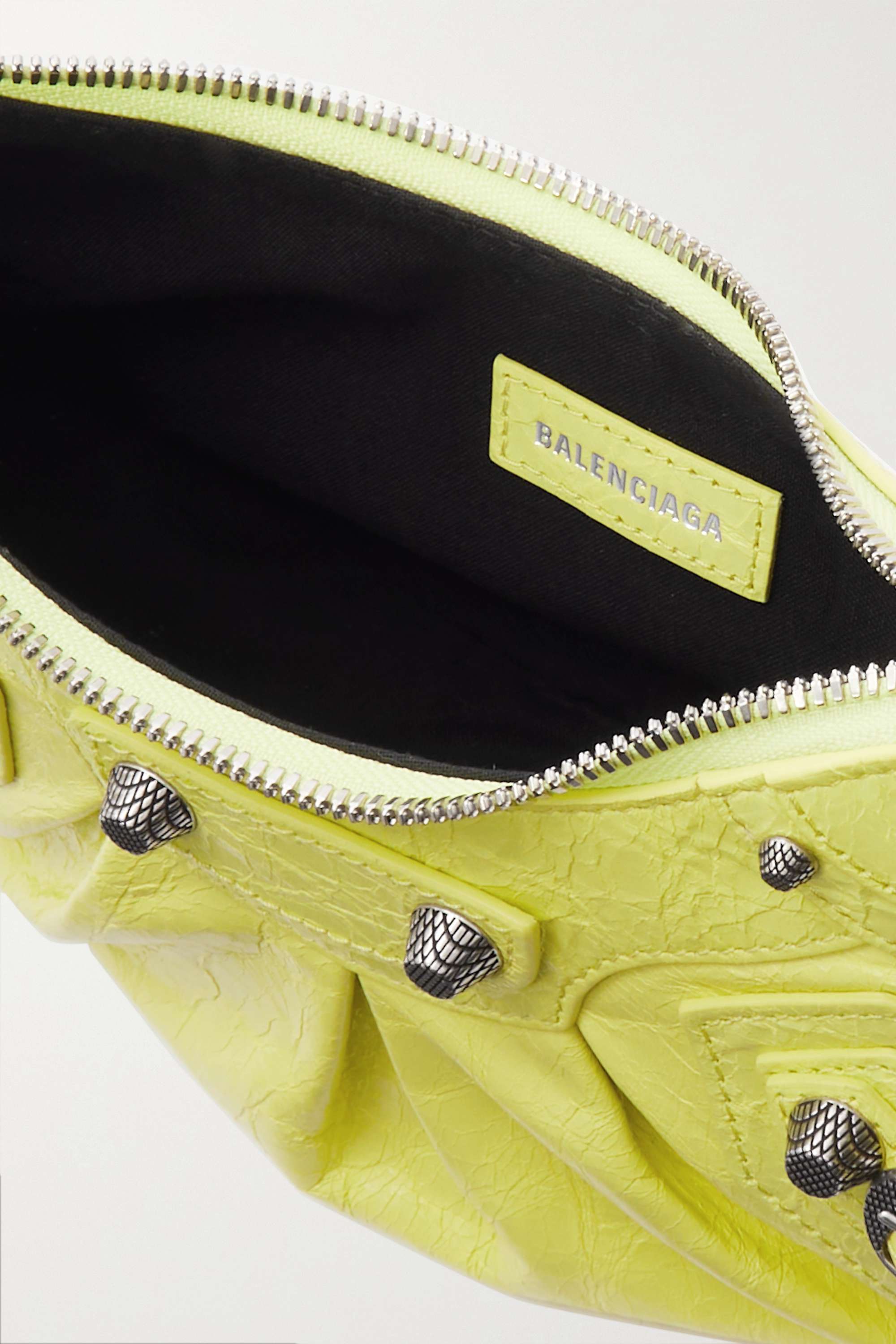 BALENCIAGA Le Cagole XS studded crinkled-leather shoulder bag yellow