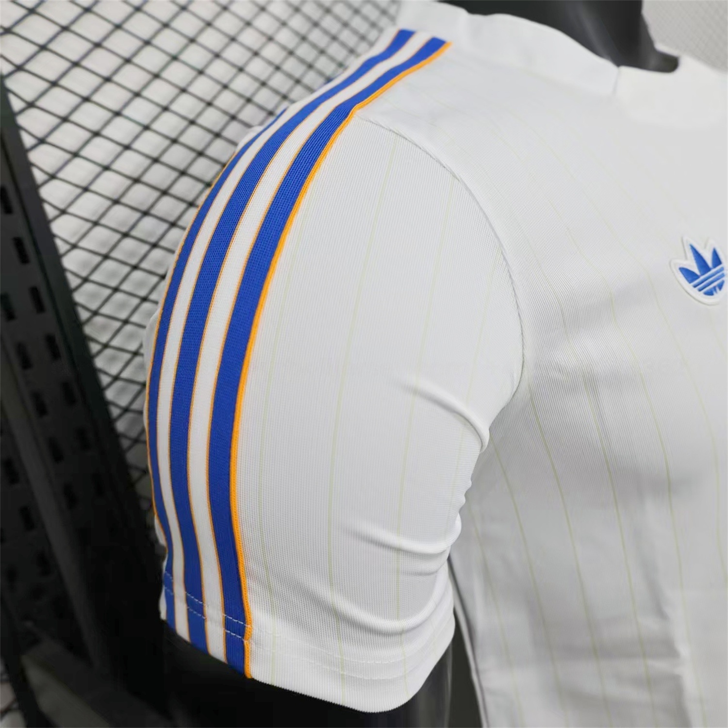 Real Madrid 25-26 Trefoil Blue Lines White Travel Jersey - Player Version - ReplicasJersey